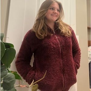 Here is the maroon jacket on!